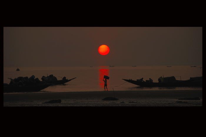 Sunset over Bay of Bengal at Frasergunj, West Bengal, India by bhaswaran