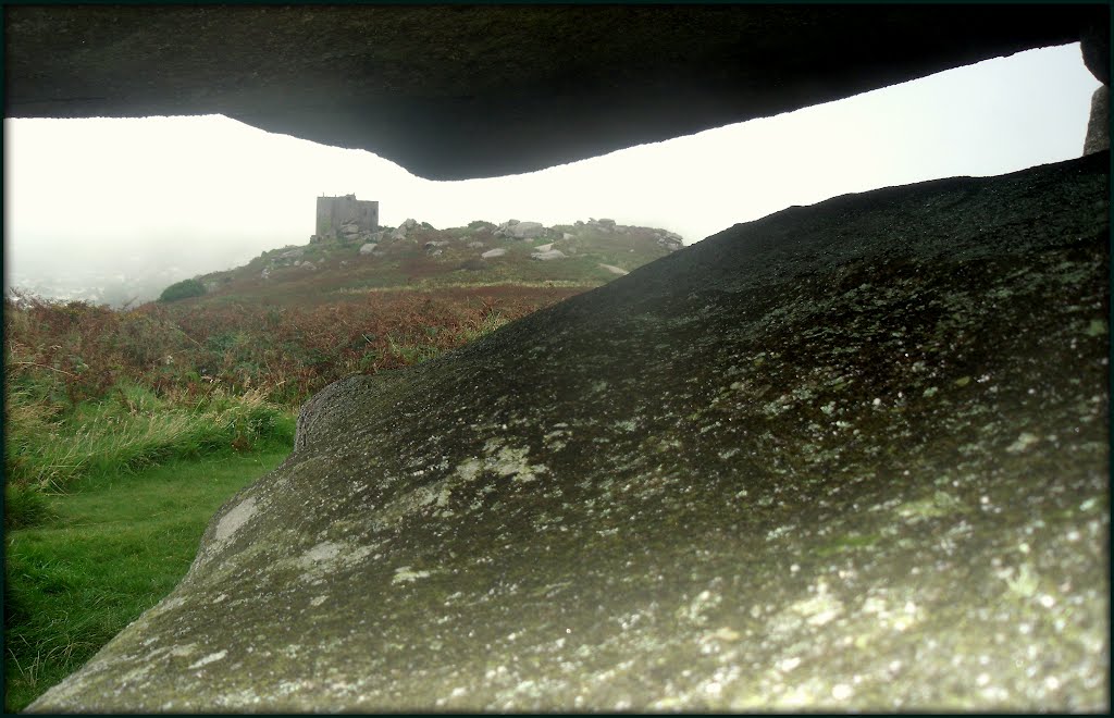 Carn Brae Castle in the mist by Andy Rodker