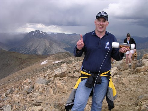 Me on top of Mt. Elbert, 14,433 ft. by Chris Thibodeau