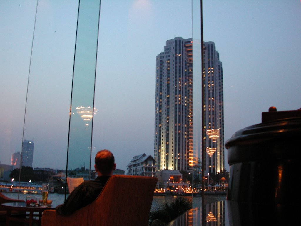 The Peninsula as seen from bar at Shangri-La hotel, BKK by Watcharee