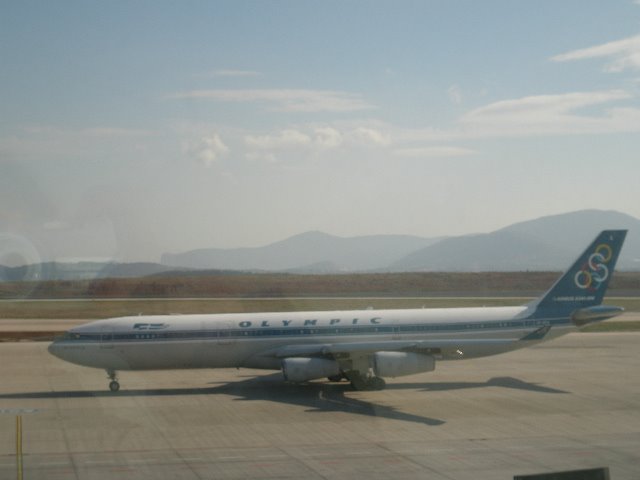 El. Benizelos Airport, LGAV, Olympic Airlines, Airbus 340, 1-2-2008 related video at http://youtube.com/alkonst by alkonst