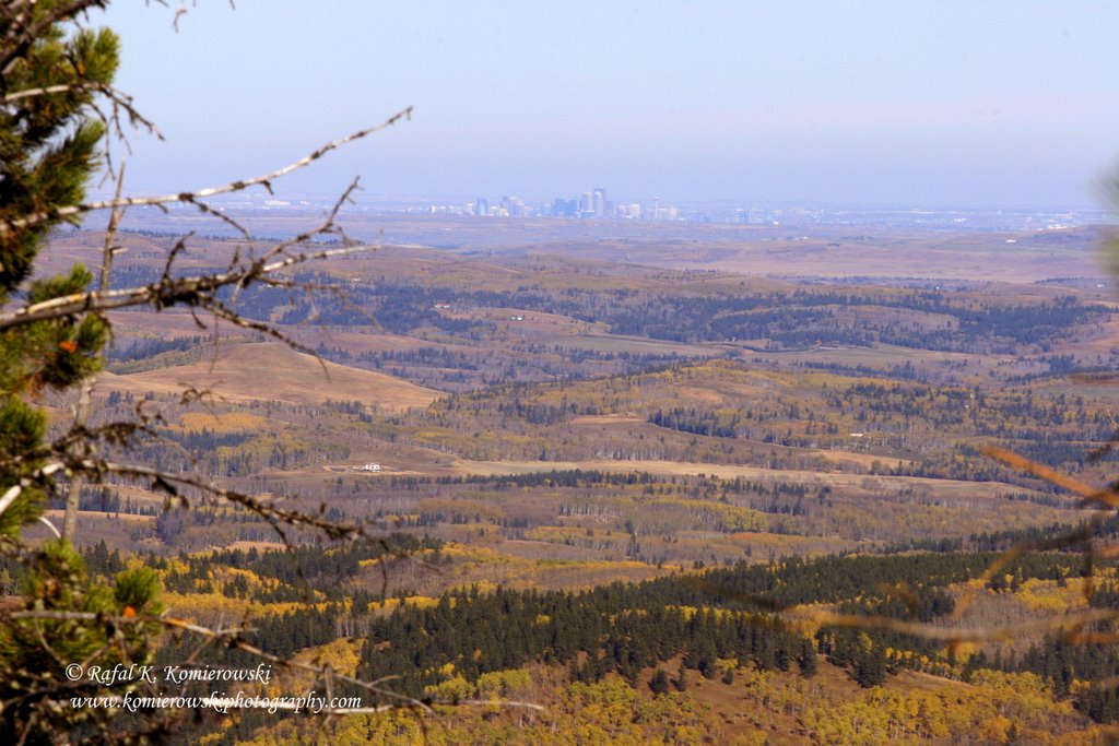 Accross Foothills View of The City of Calgary, Approximately 80 km (50 miles) by Rafal K. Komierowski