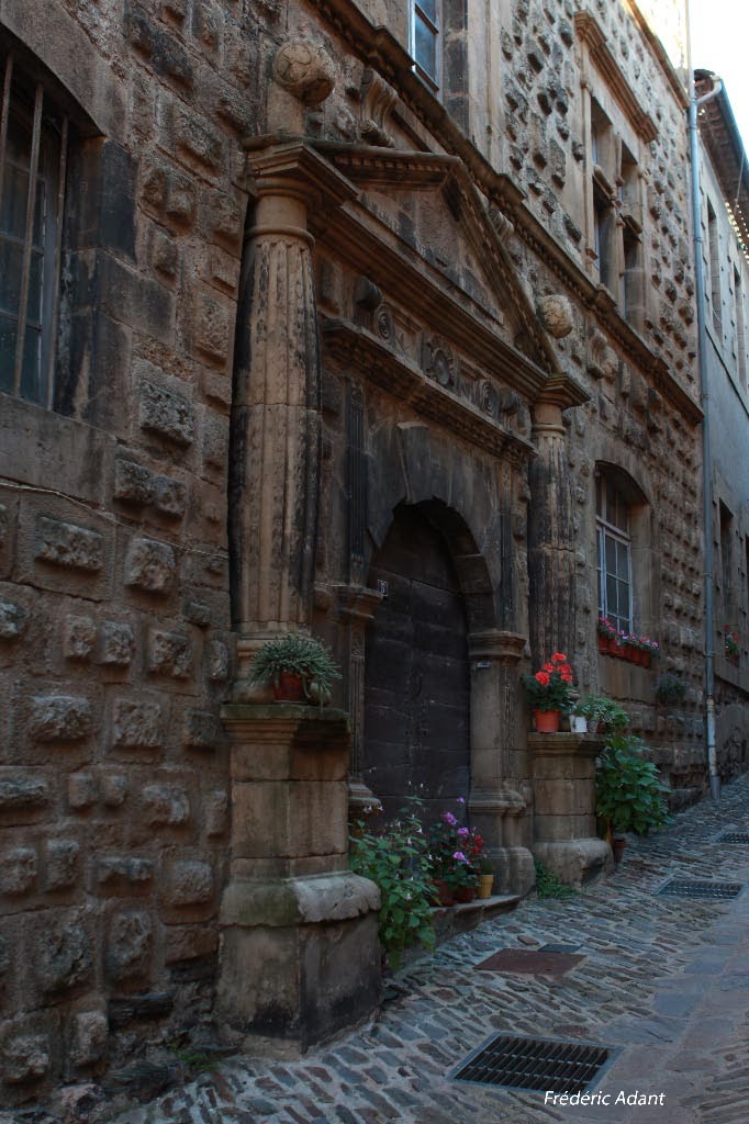 LA RUE DE L'EGLISE A FLORAC by Frédéric Adant