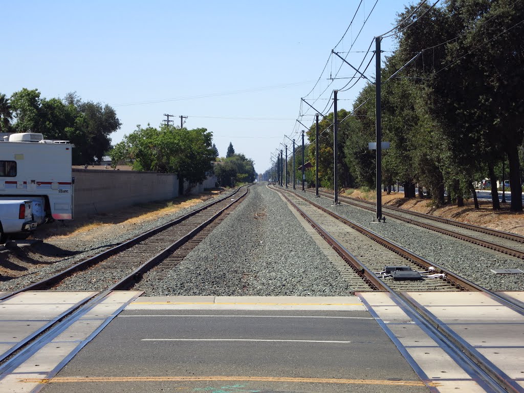 Light rail and railroad track (looking west) by VasMan