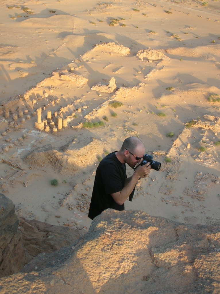 A famous photographer at work atop a 95m (300 ft.) cliff - Jan 2005 by MaxFarrar