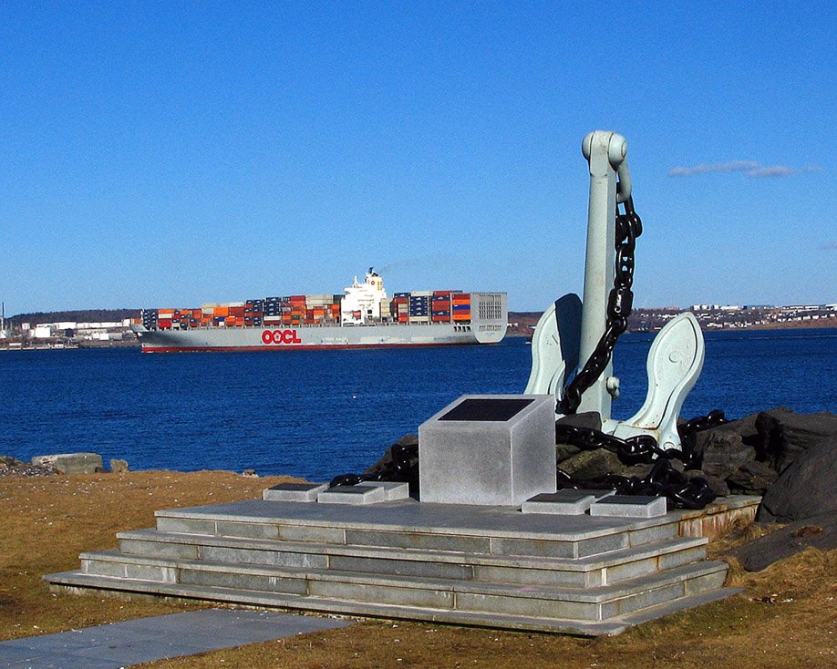 Container ship coming into port by Howie Hennigar