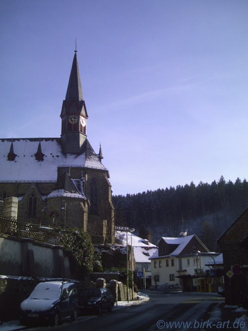 The church of Schmitten on a winter's day from Kanonenstrasse, Germany by bastian birk