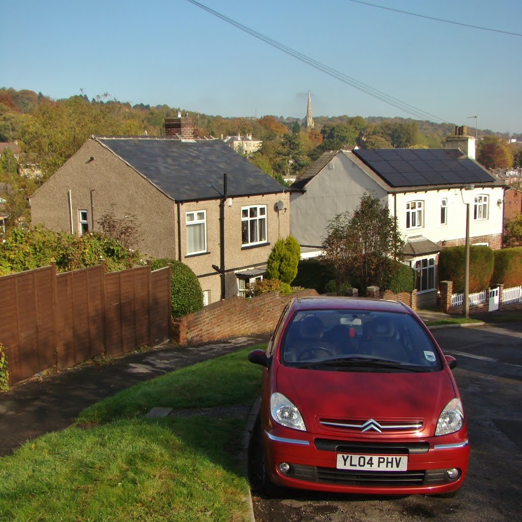 Parked car and two homes on Armthorpe Road with St. John's church spire in Ranmoor behind, Hangingwater, Sheffield S11/S10 by sixxsix