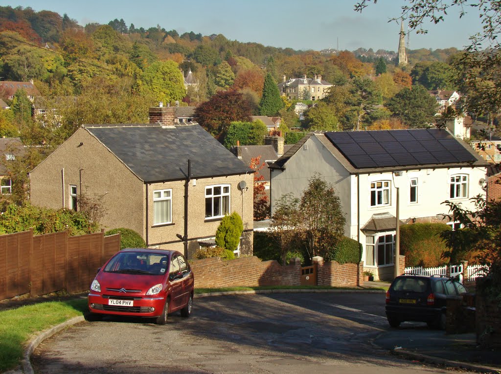 Parked cars and two homes on Armthorpe Road with St. John's church spire in Ranmoor behind, Hangingwater, Sheffield S11/S10 by sixxsix