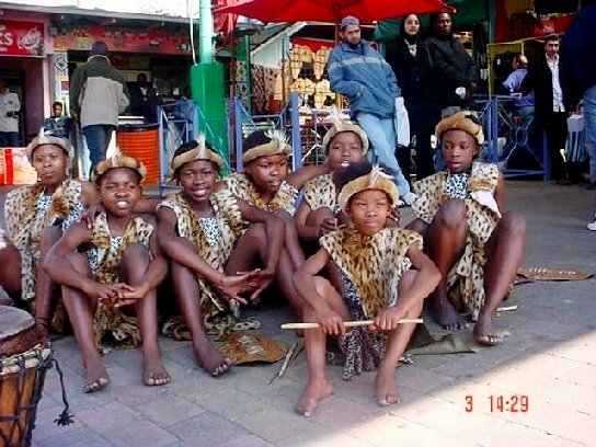 Dancers at Bruma Flea Market - Joburg - S.A. by Maria Abreu