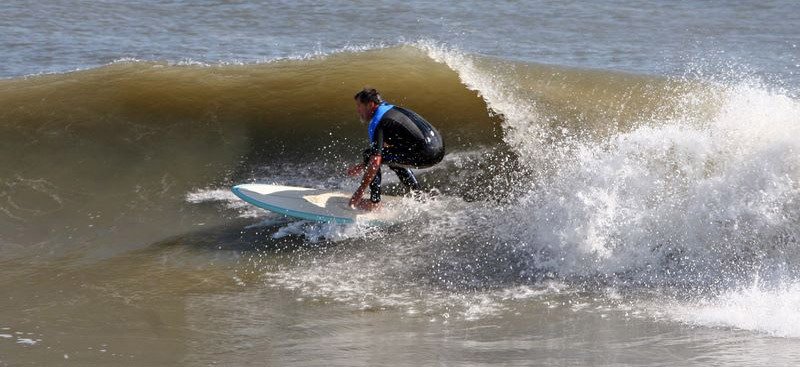 Surfing by Matthew Kulcsar