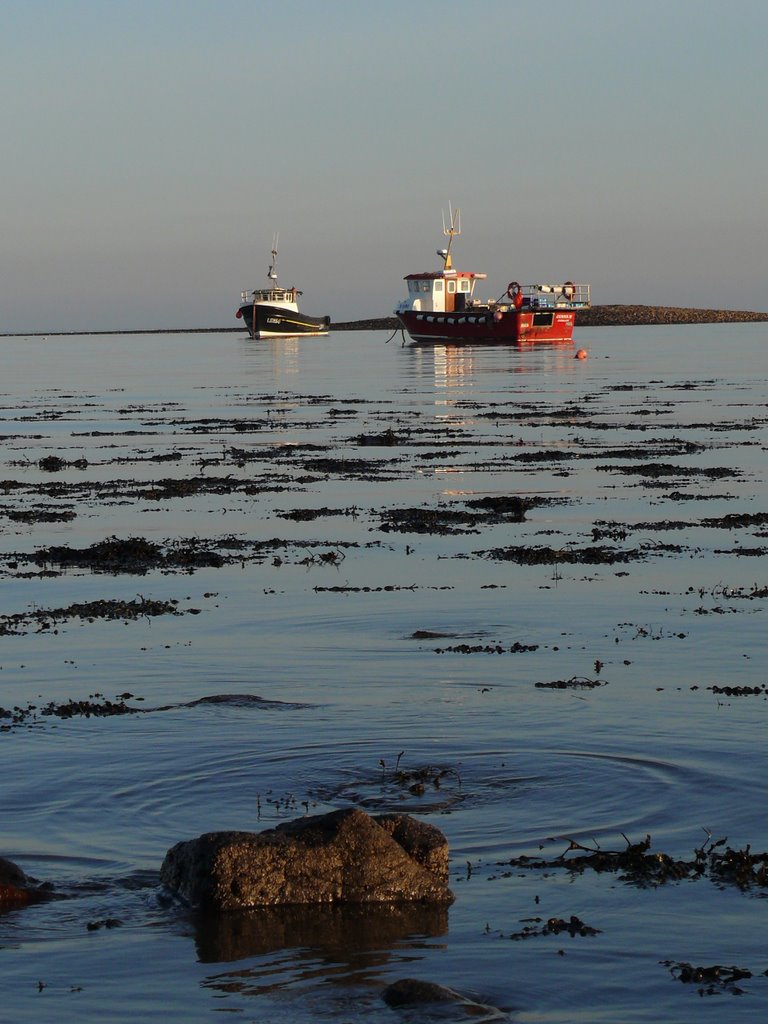 Boats outside Lindisfarne harbour by David Rooney