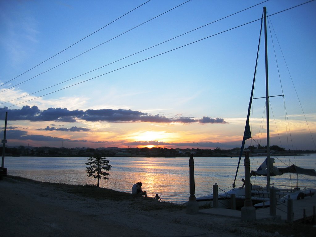 Sunset over Lake Peten Itza by Ceiba Realty Belize