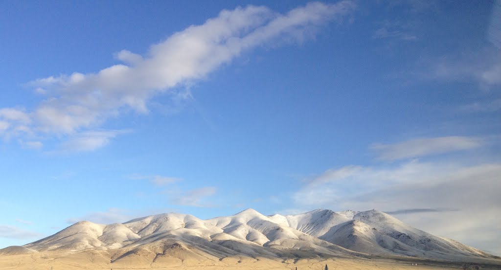 Snow-Dusted Spring Peaks by sloanthomas94