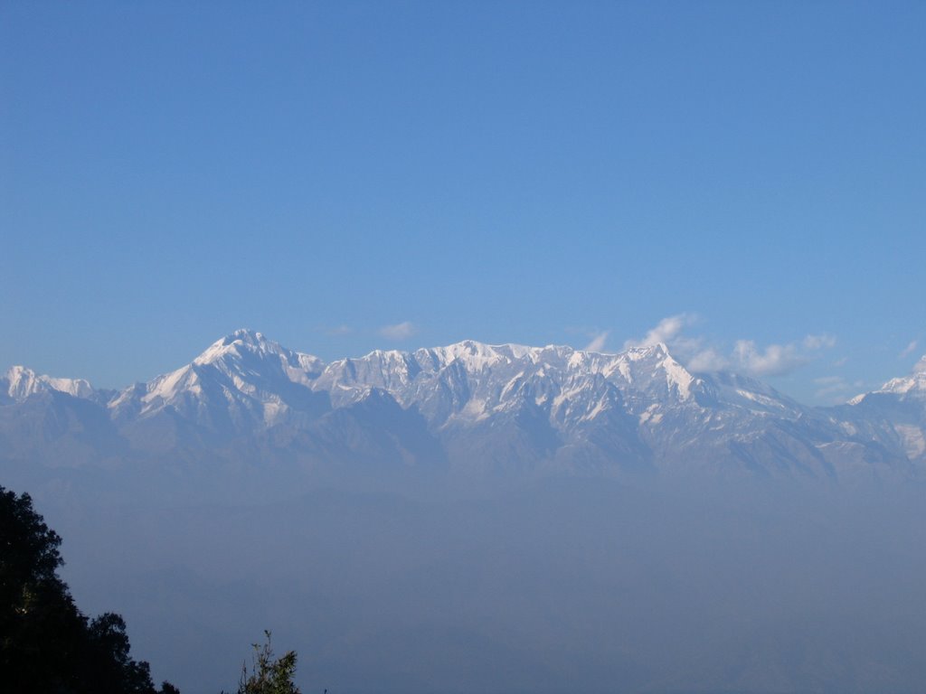 A view of Nanda Devi, Kedarnath, Chaukhamba, Trishul, Panchchuli and Nanda Kot. from KMVN tourist bungalow, Binsar by Mushir Killedar