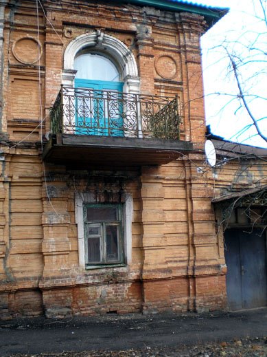 Old house's balcony by Sergei Sarychev