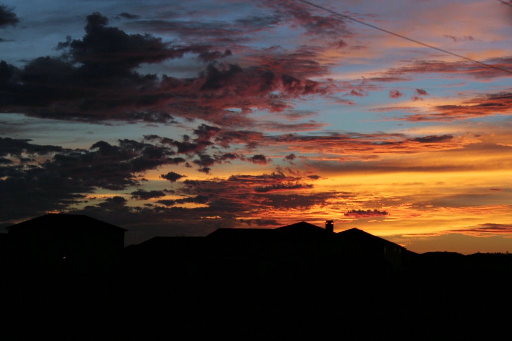 Sunset and roofscape by Ryan Calhoun