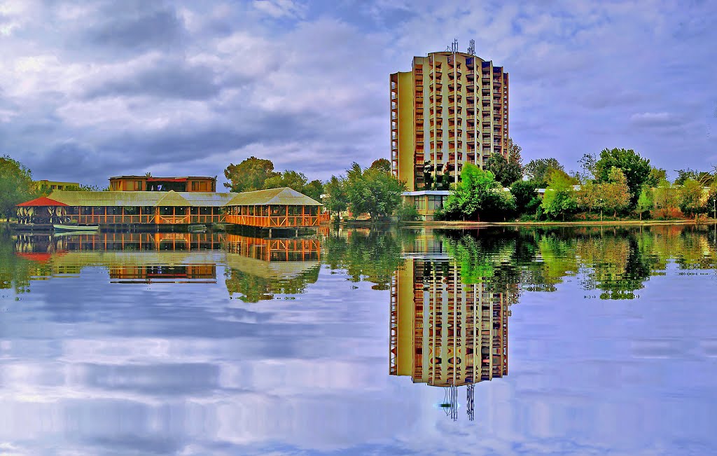 The reflection of a beautiful and peaceful day of autumn by Laurentiu Mitu