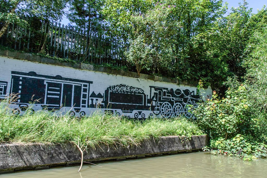 The start of the amazing black and white community railway mural designed by Bill Billings by hilofoz