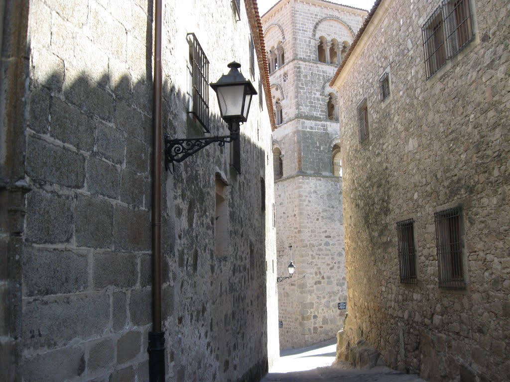 View from a small street at the tower of Iglesia de Santa Maria la Mayor, Trujillo, Spain by Lucien Kivit