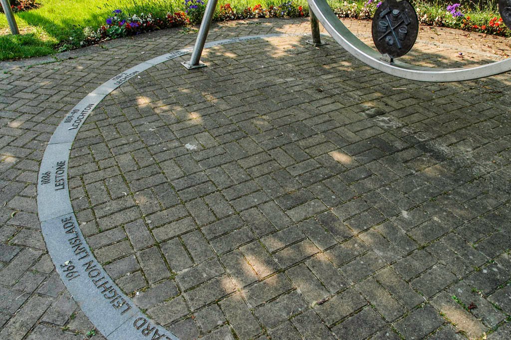 The circular arrangement of names at the base are the various historical names of Leighton Buzzard by hilofoz