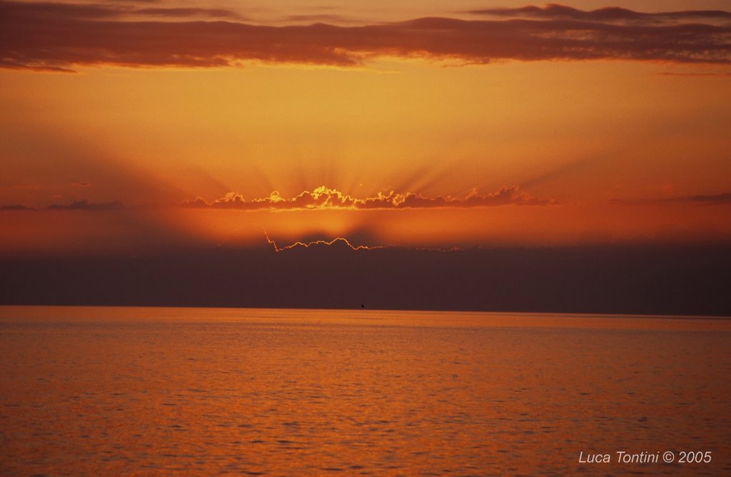 Sunset at Agios Gordis by raccoon66