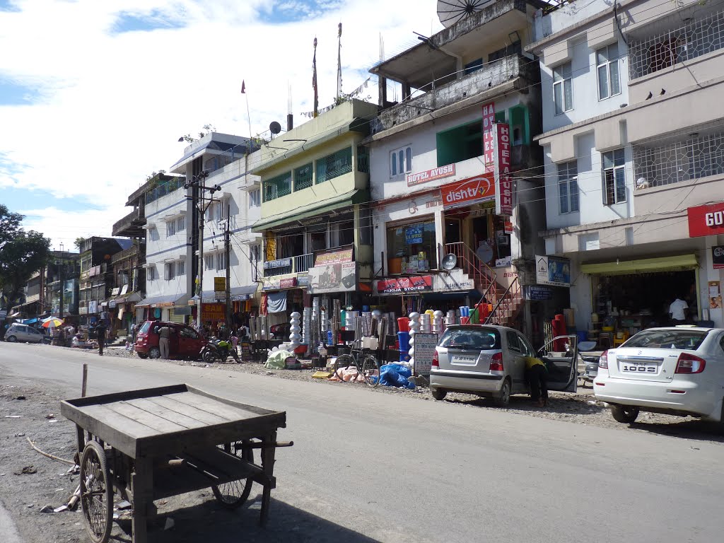 Mainstreet with stores by scheepshuid