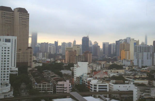 KL dawn Skyline when the towers disappear in the clouds by A Syaharuddin K