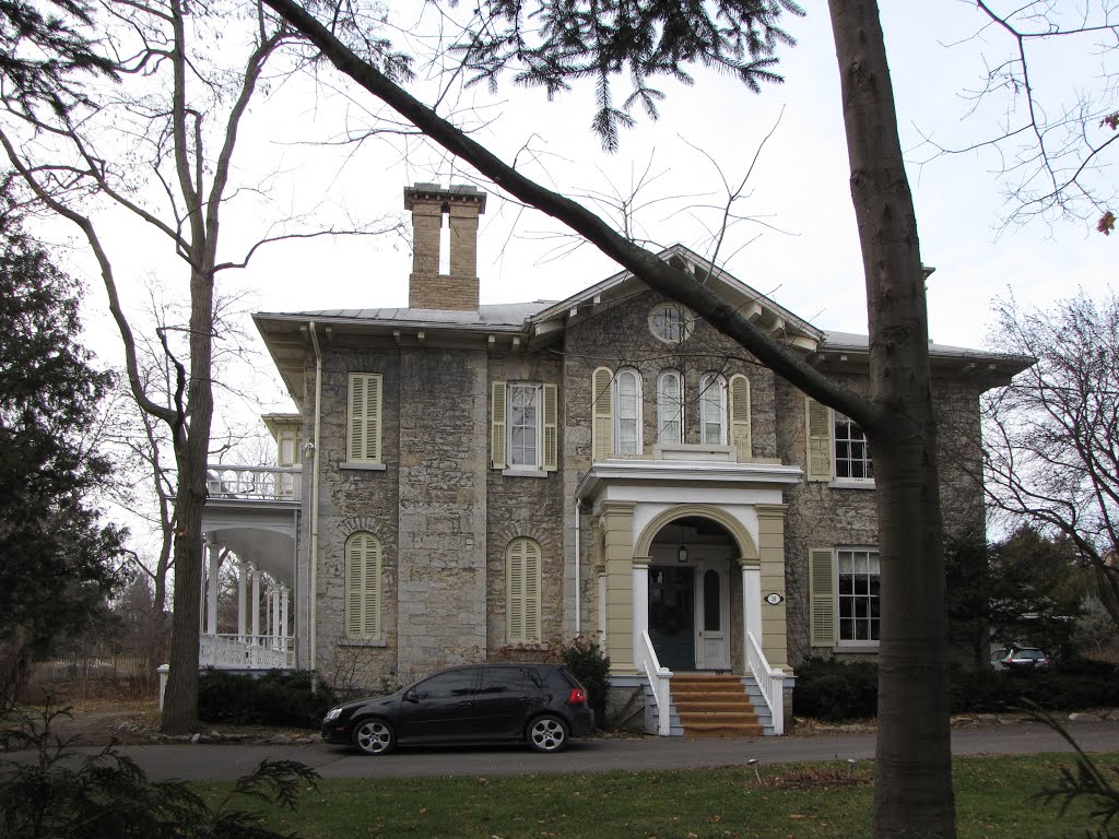 Magnificient stone house. note the large porch on the left side. Built about 1845. Imagine heating it with hand cut wood 160 years ago. By 1900 there were few trees left in the area. Coal was not available before 1871. Coal gas first appeared in 1847 to light streets, but it would have taken years for piping it to here. Oil lamps provided lighting for a long time. by Steve Manders