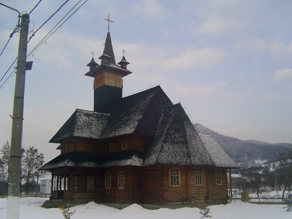 Wooden church in Baia Sprie, Romania by Alexandru Szasz