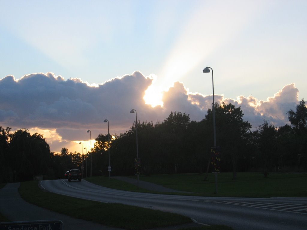 Sunset behind clouds by Bent Kyhnau