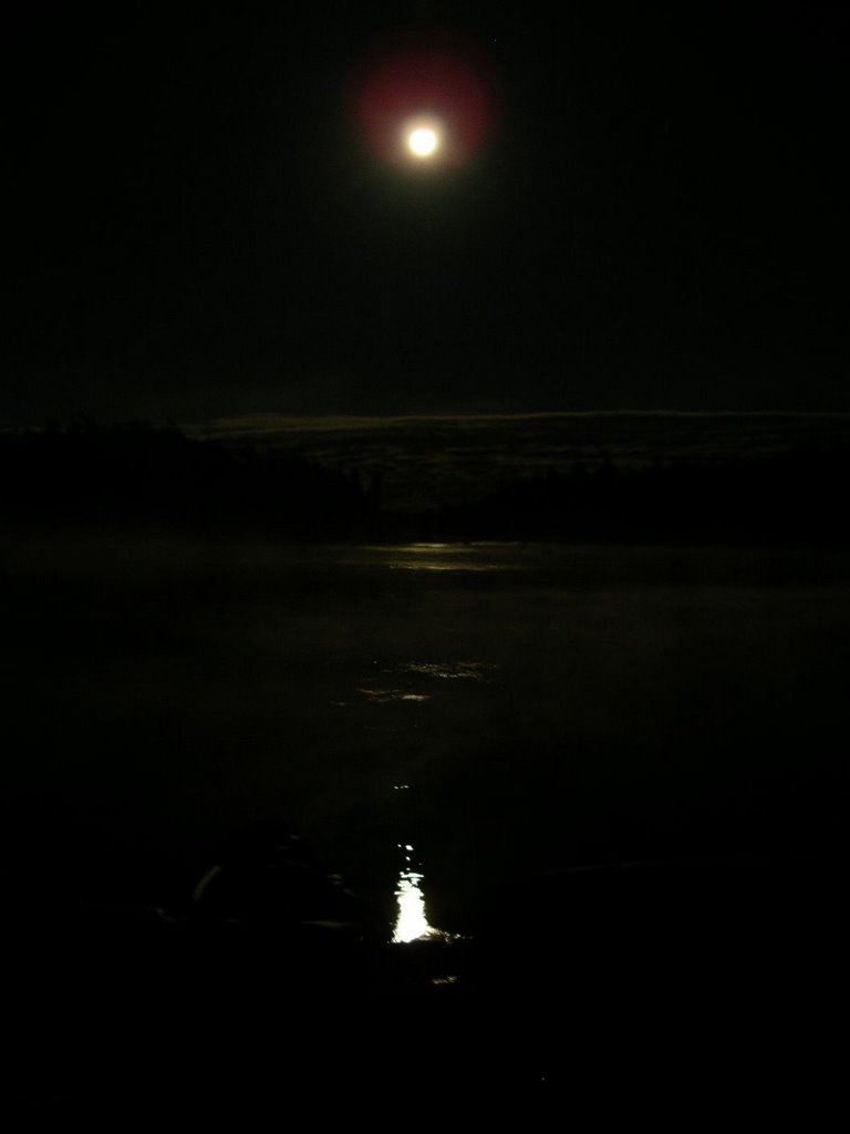 Moon over the campsite by Lester Kovac