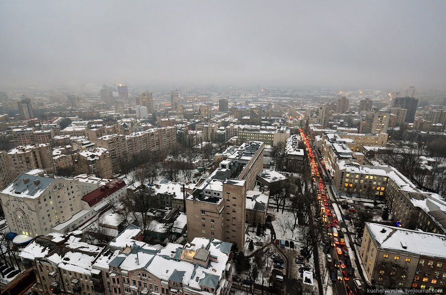 View of Kiev at dusk from the roof of a construction site in Vorovskogo street near the former Sennoi Market by missoni