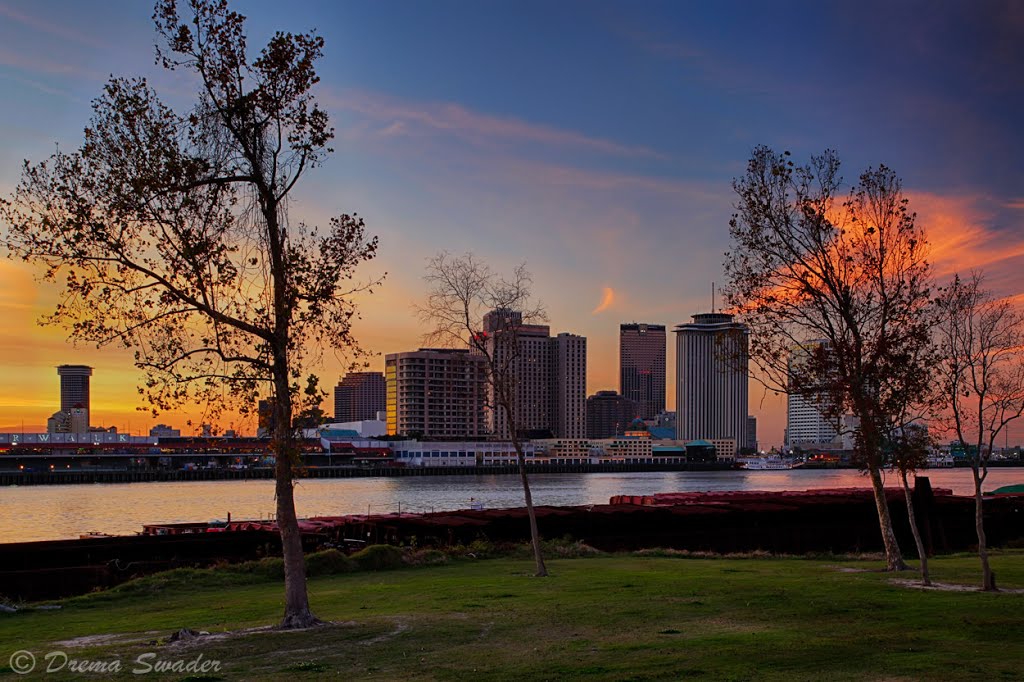 New Orleans skyline at sunset. by Drema Swader