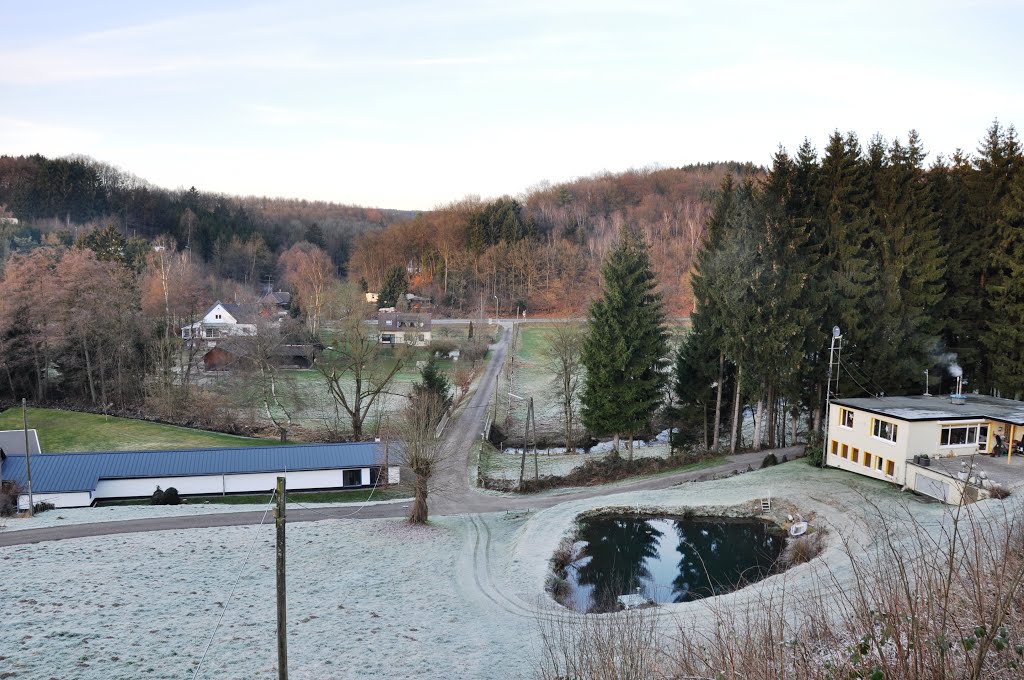 Lindlar / Germany: Blick vom Bahndamm der ehemaligen, 1960 demontierten "Sülztalbahn" über "Lindlar - Bruch". Der Bahndamm ist heute ein gut ausgebauter Fußgänger-, und Fahrradweg der dem "Bergischen Panoramasteig" angehört. Abgelichtet im Januar 2013. by © "Earth Views"