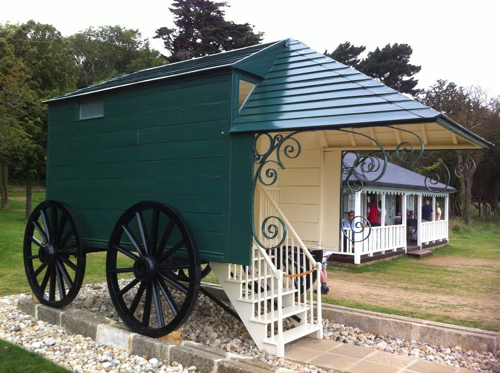 Queen Victoria's Bathing Machine in its new home on the sea shore by cowbridgeguide.co.uk