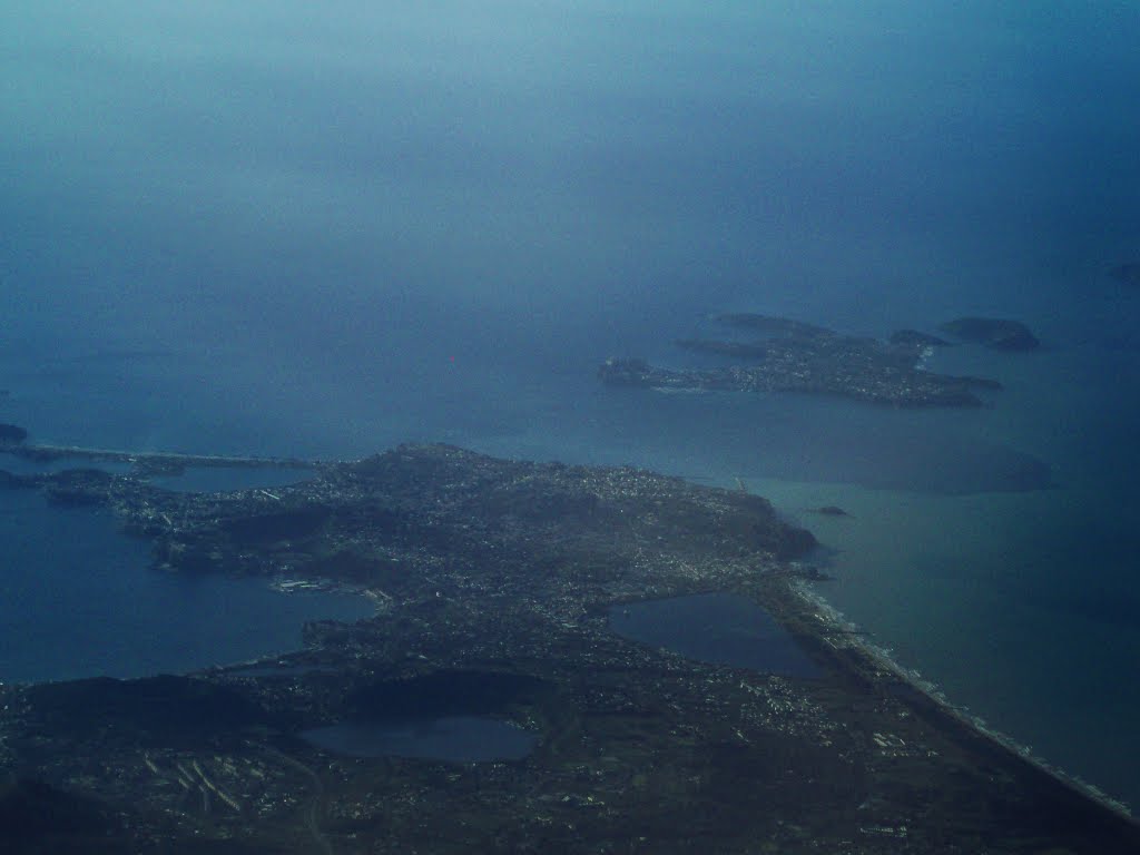 BY PLANE - Vista aerea dei Campi Flegrei. In primo piano: i laghi Averno e Fusaro. In fondo, l'isola di Procida. by ferdonio