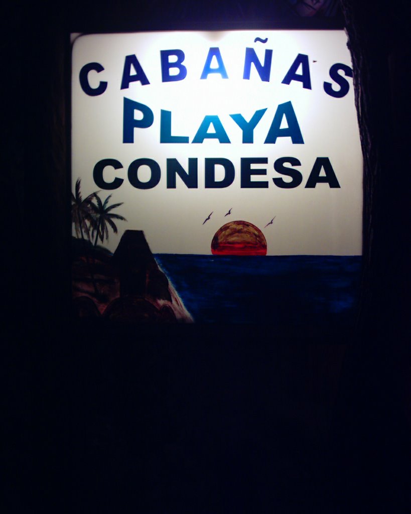 Sign in front ofthe Playa de Condesa cabanas Playa Tulum by Fred Lark Brown