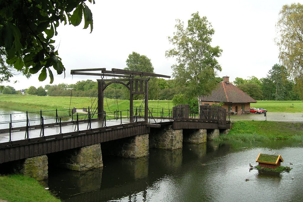 Wooden bridge over the moat around Gamlebyen near glasswork workshop - fortified historic part of Fredrikstad by Tomas K☼h☼ut