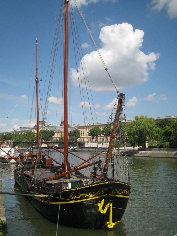 Old ship moored by Seine River by Quique Morrique