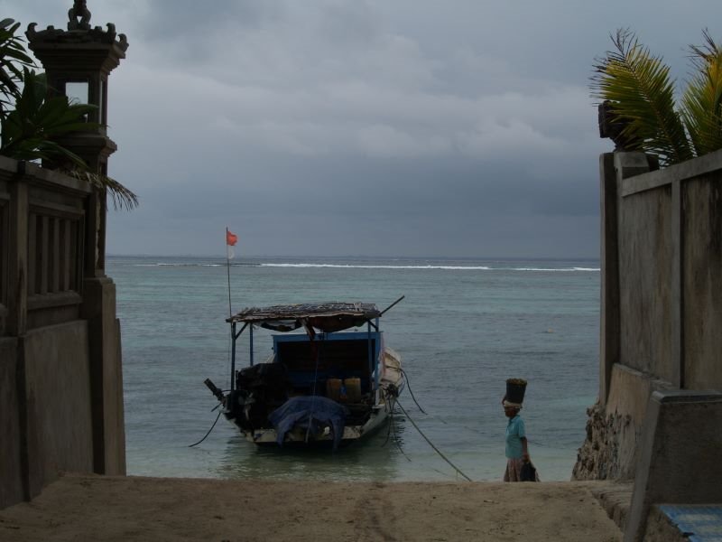 Freight vessel at Jungtubatu Beach by remco@wijnings.com