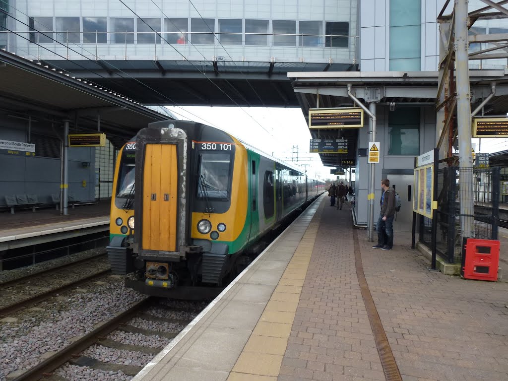 Train At Liverpool South Parkway Station. by Peter Hodge