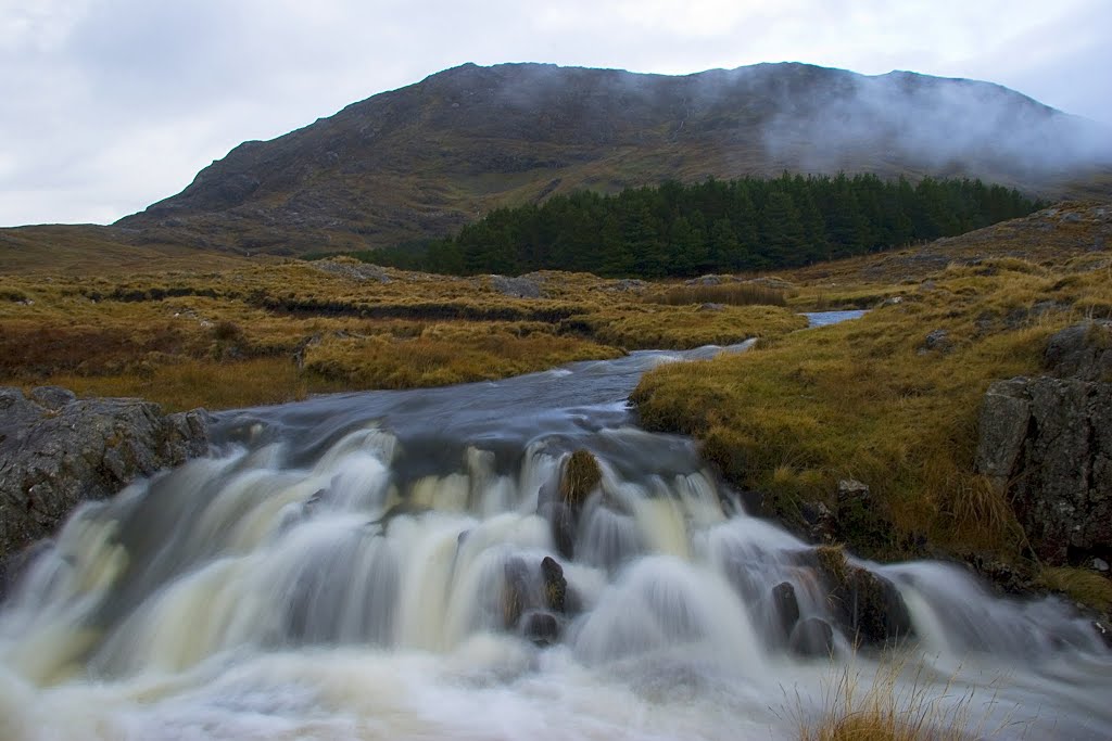 Stream and hill by aquaeolas