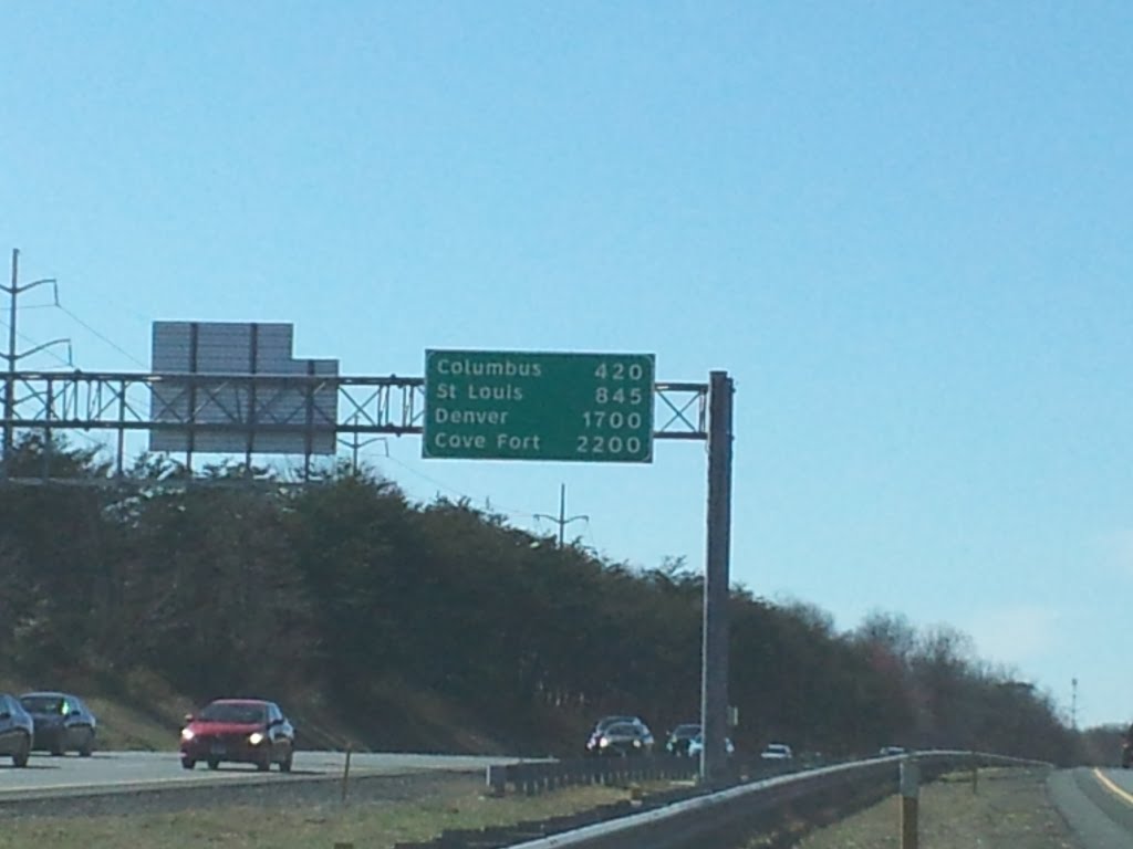 Long distance mileage sign at beginning of Interstate 70 by SchuminWeb