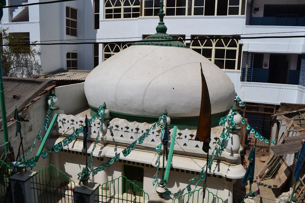 The dome of the dargah with the tablighi Kumbarpet mosque in the background. by Ar. M.Ali