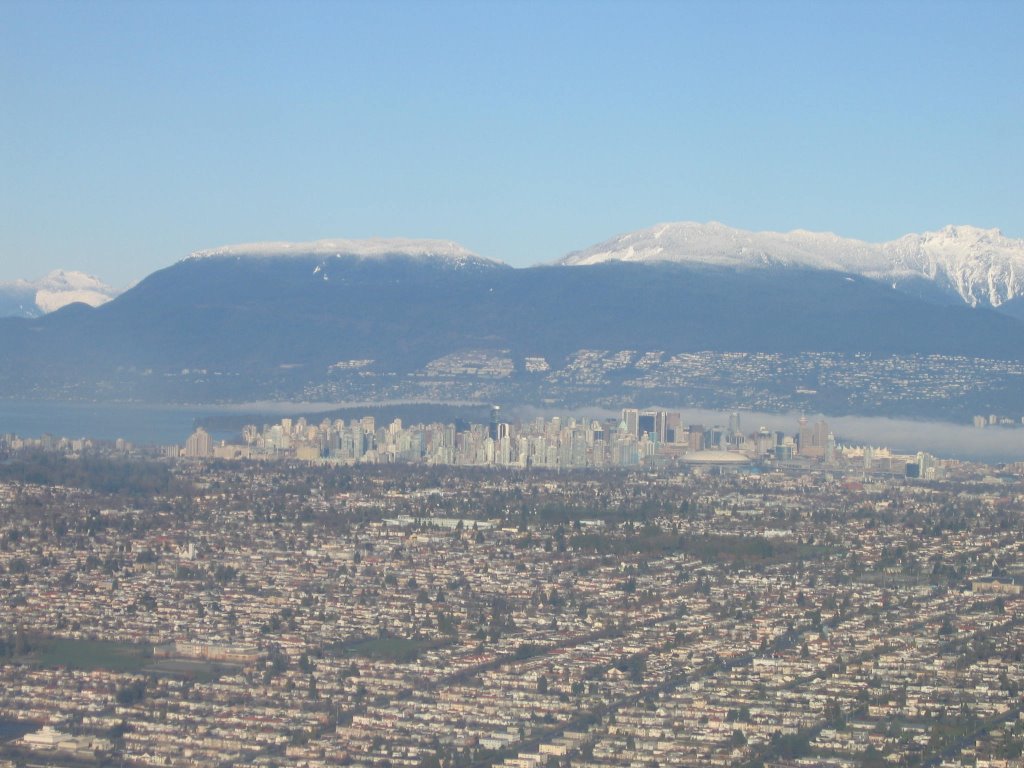 Aerial of Vancouver and Mountains by Jonathan Arnold