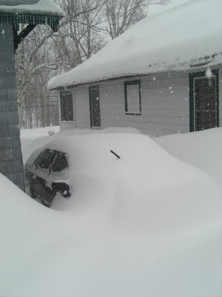 Spring snow storm - 30 inches fresh snow. Our Volvo, buried! Saranac Lake, march 7, 2011. by Tom Dudones