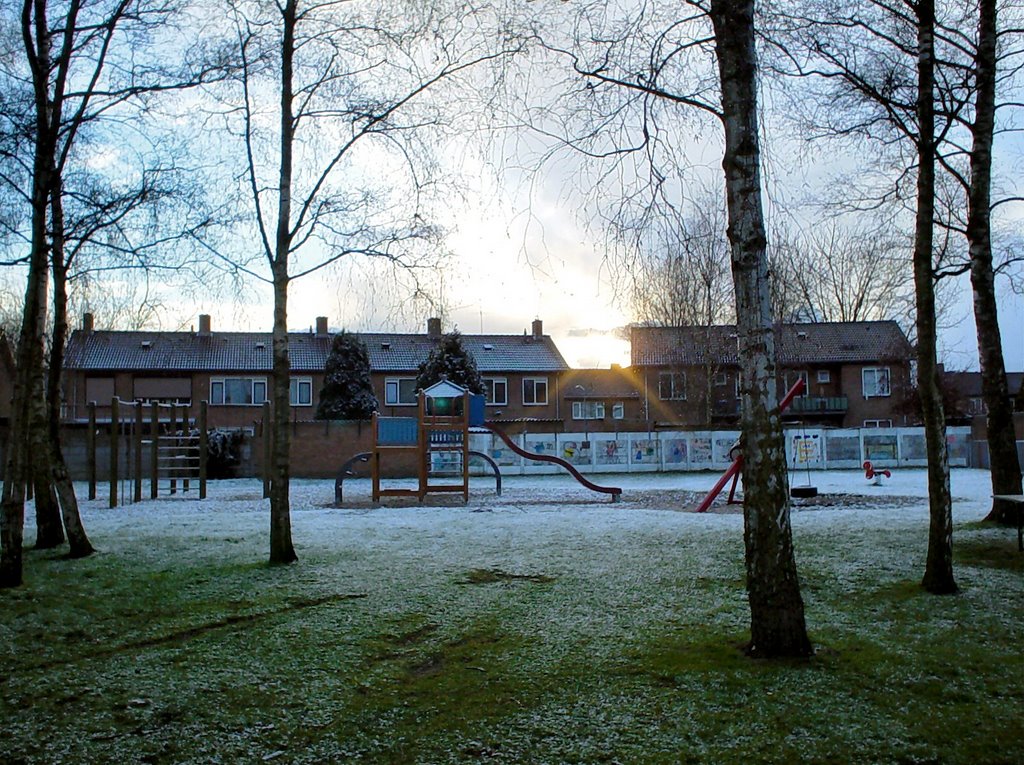 Sunset after snowshower at children's playground De Renne, Helmond by uaf