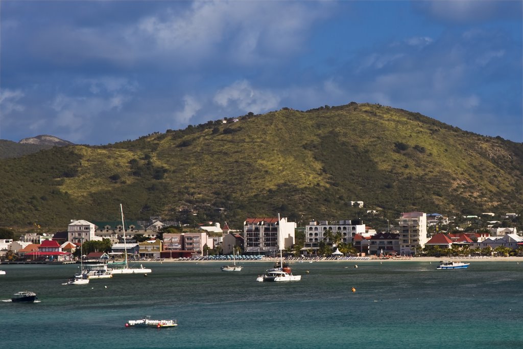 Hotels and resorts near a beach on St. Maarten by Phil Comeau