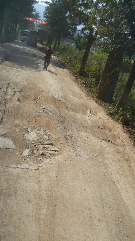 Bumpy road to Jingzhen, Xishuangbanna by Colin W